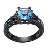 Image of Black Gold Classical Cut Light Blue Wedding Ring