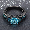 Image of Black Gold Classical Cut Light Blue Wedding Ring
